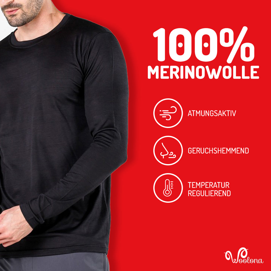Ein Mann trÀgt schwarzes Merino-Oberteil. Es ist atmungsaktiv, geruchshemmend und temperaturregulierend.